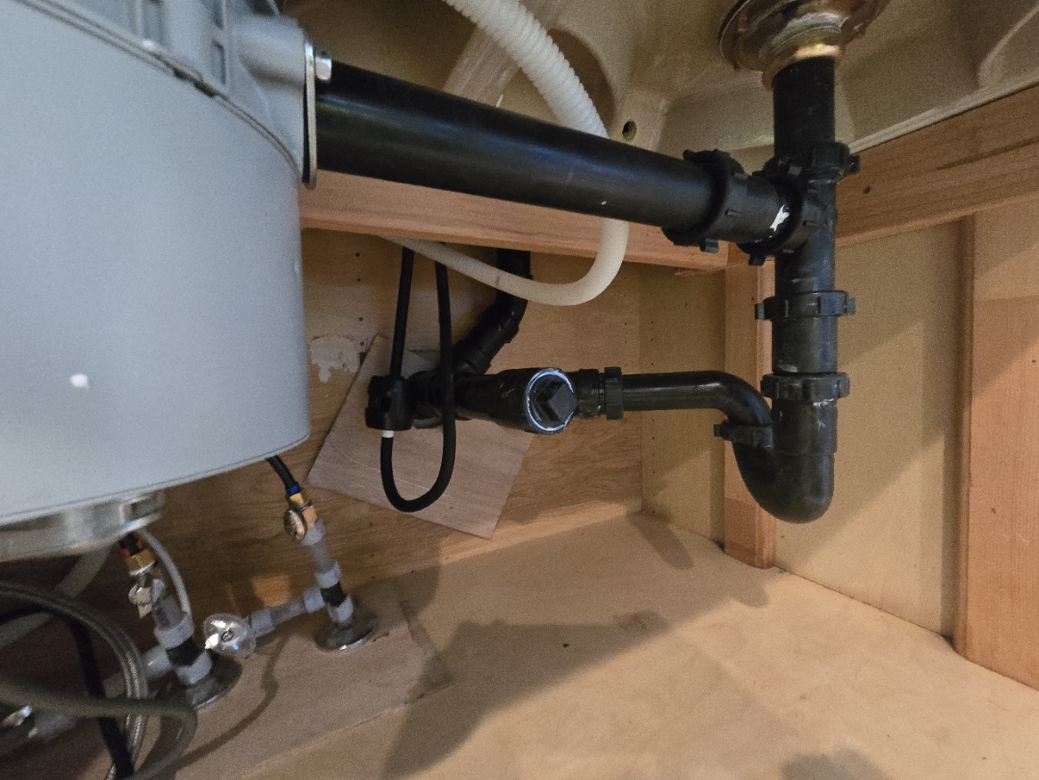 Under-kitchen plumbing repair